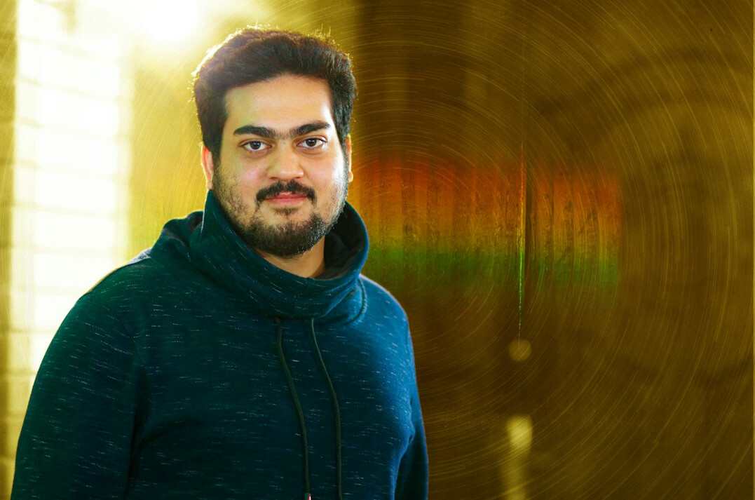 Studio portrait of a Central European man software developer in his 30s wearing glasses
